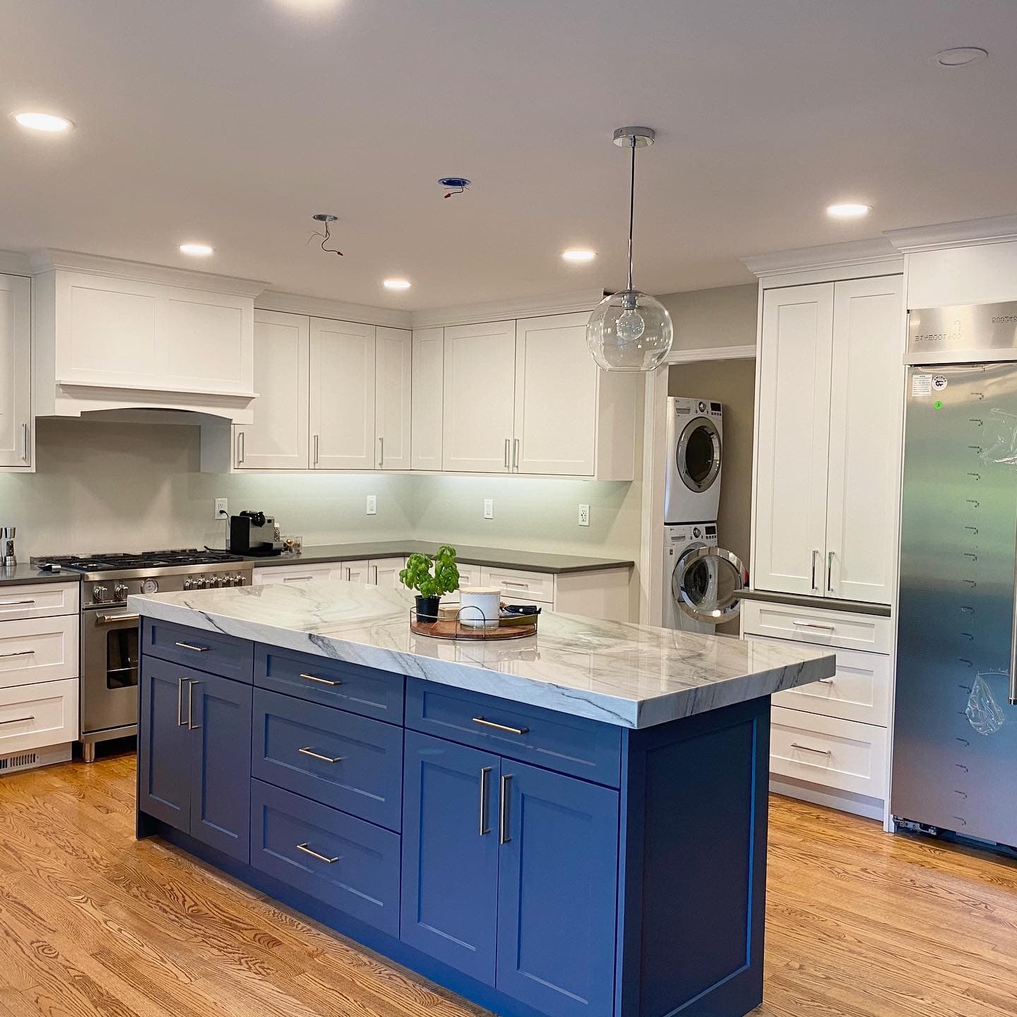 Kitchen island topped with white marble